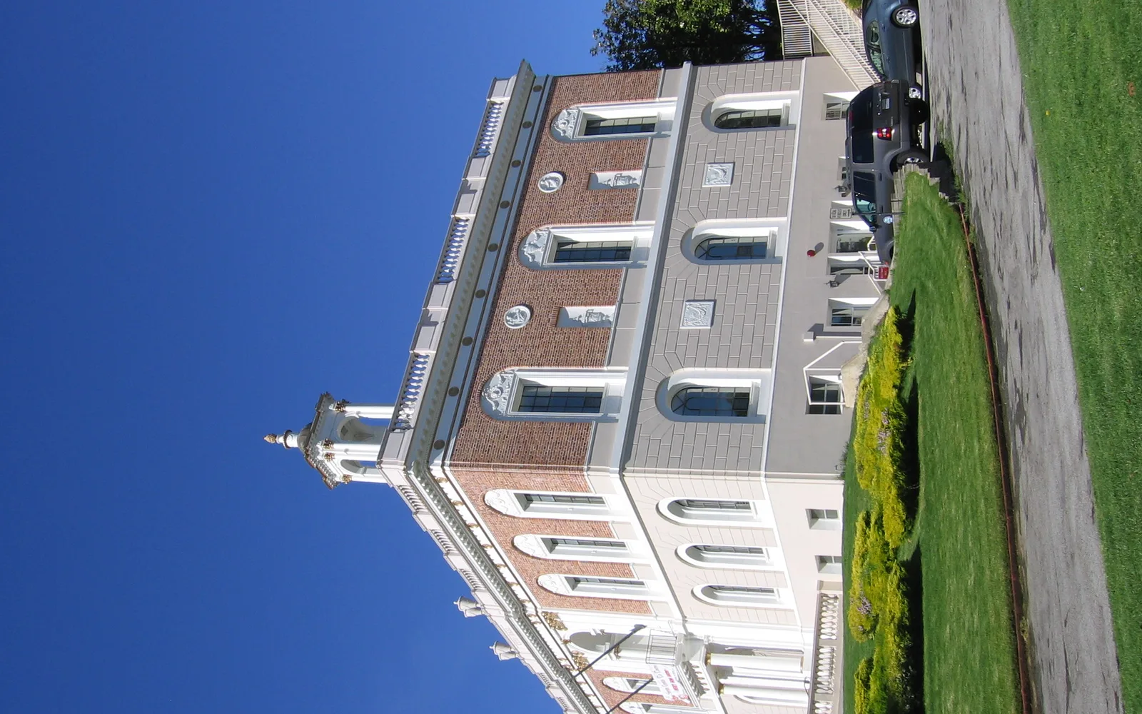 South San Francisco City Hall, a historic civic building with distinctive architecture facing Grand Avenue in downtown South San Francisco